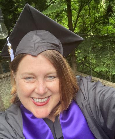 Lauri Hennessey in graduation cap and gown