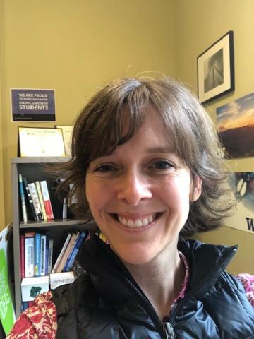 Aimee Kelly smiles at the camera